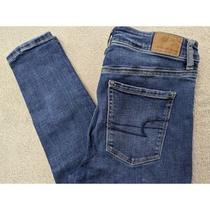 American Eagle Super Hi-Rise Jeggings Size 4 Blue Distressed Ripped Jeans